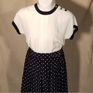 Business outfit navy polka dot skirt & cream blous